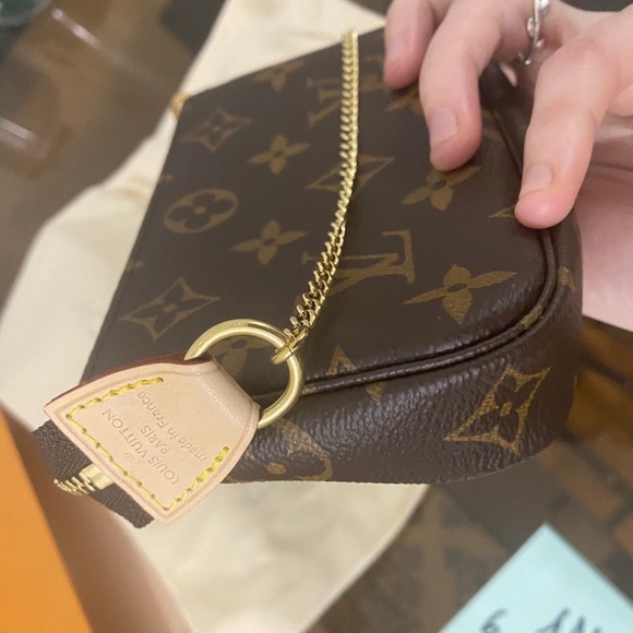 Mini pochette in monogram - Picture 9 of 16